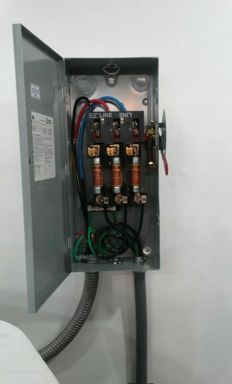 Three-phase disconnect switch installed for Smoke Detector Installation in Eagle Grove
